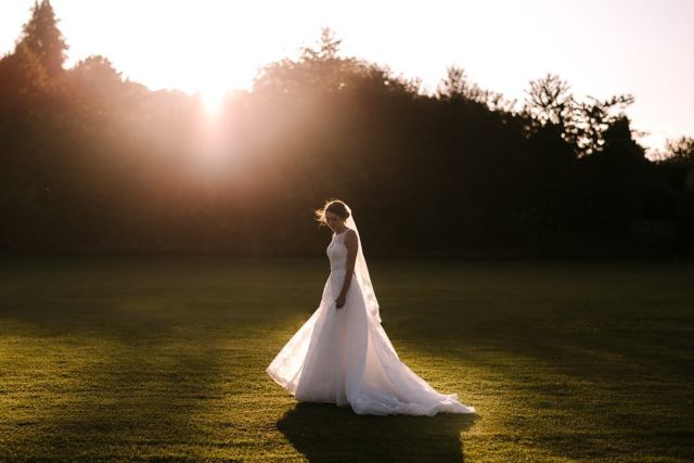 A sunset walk in a fabulous dress. Chloe + Ben
